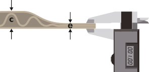 Measure the thickness of compressed material (e)